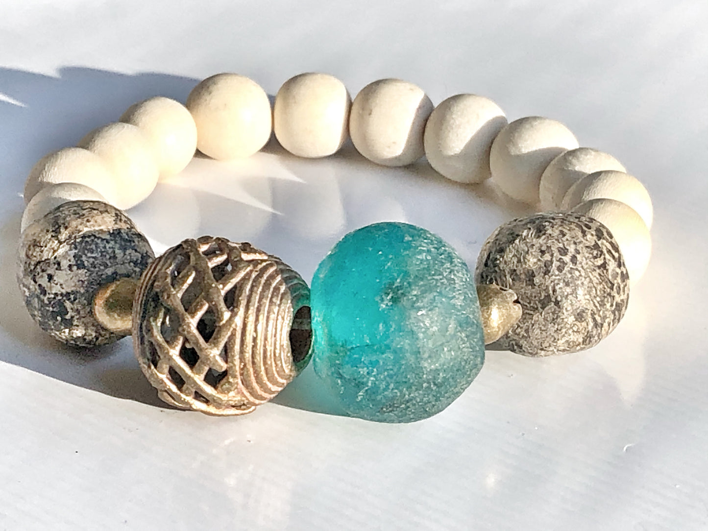 Aqua Blue Recycled Glass Bracelet with Fossilized Stegodon Beads